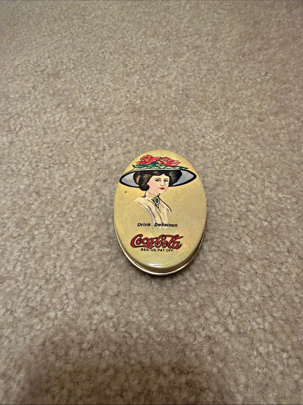 Coca Cola Oval pill box/sewing Tin with Woman in Hat